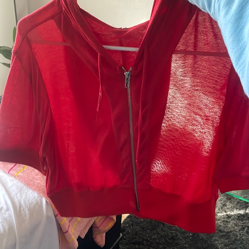 Red a zip up light weight hoodie